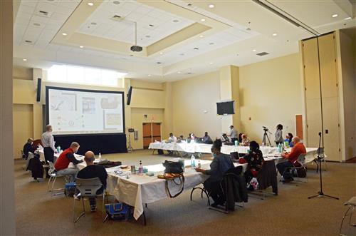 Board member training in large conference room 
